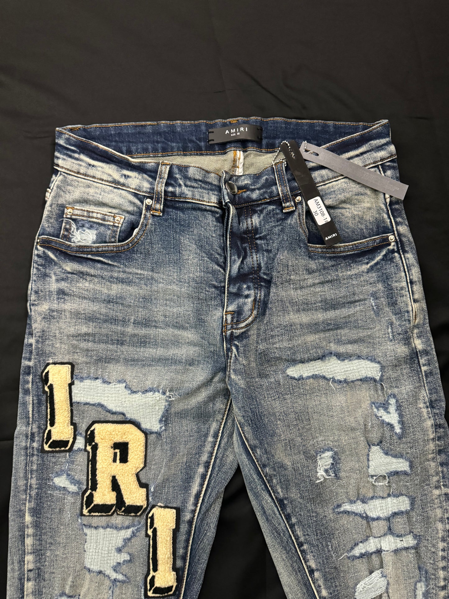 AMIRI BLUE VARSITY JEANS